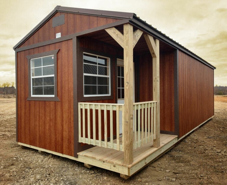 Burnett side porch cabin with a treated pine porch, delivered and set on a gravel site in Oklahoma