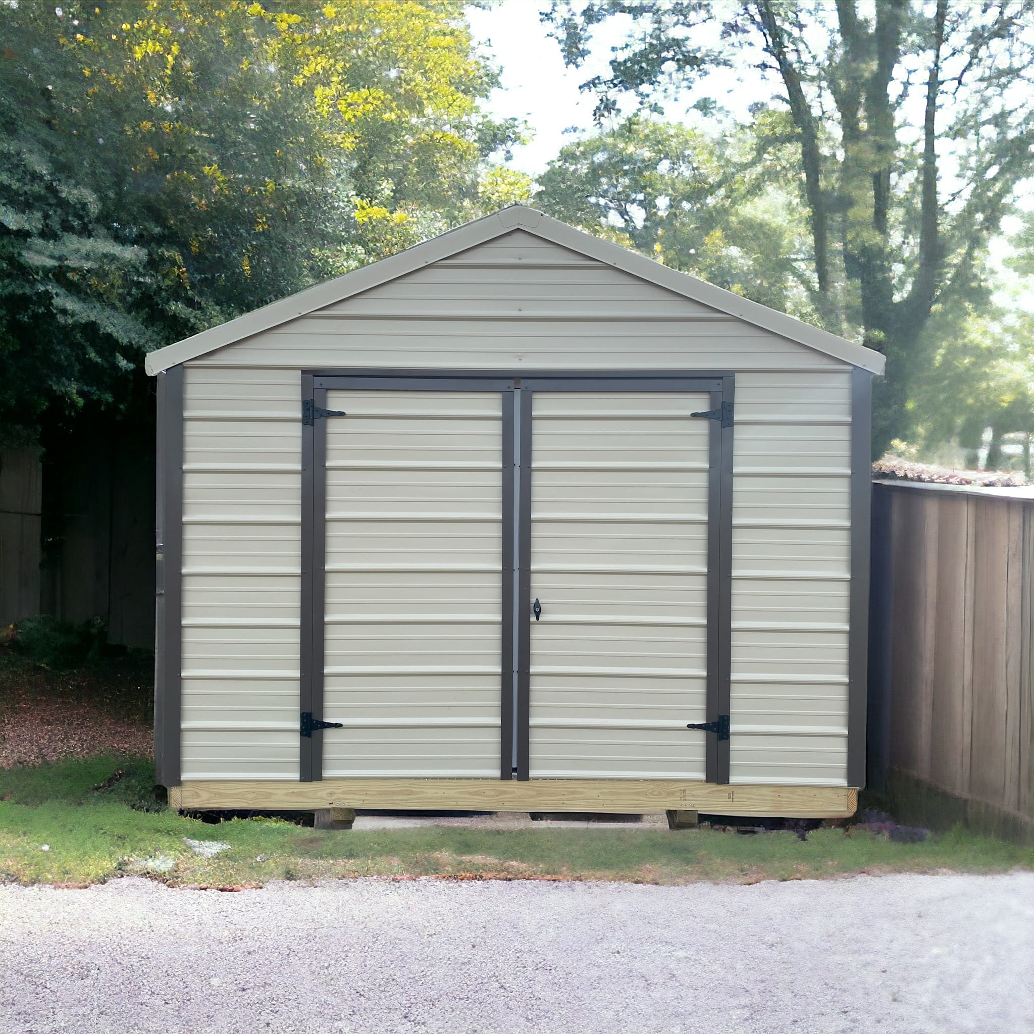 Metal Value Shed with double doors on the gable end, set on a pressure-treated floor frame